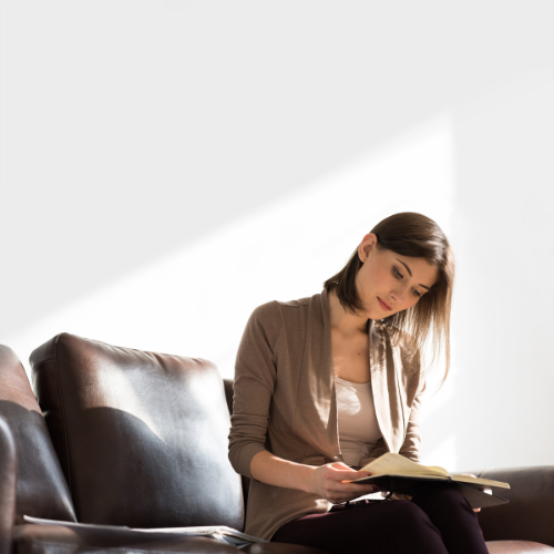 woman reviewing planner
