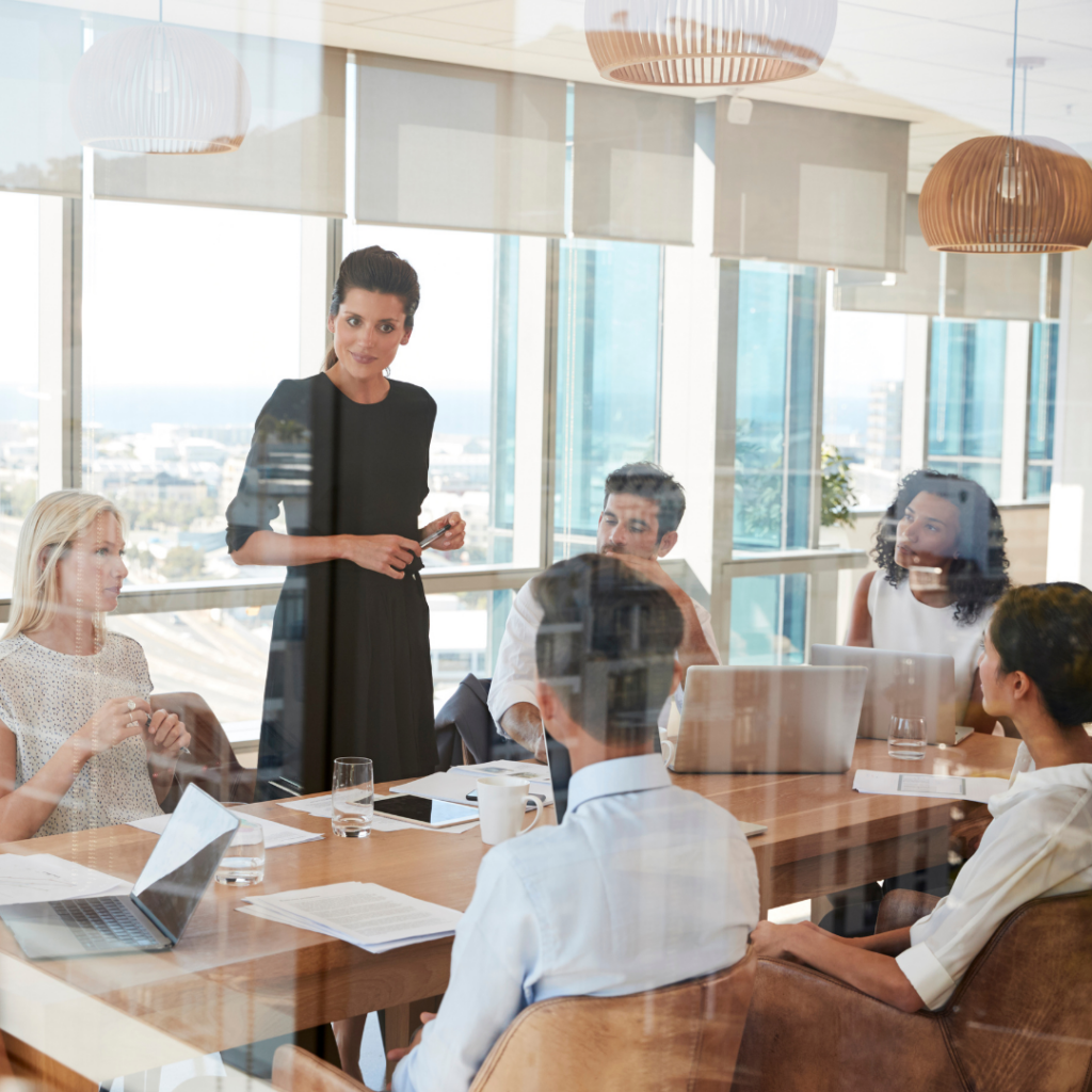 woman leading business meeting