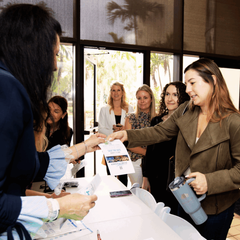 women checking in at local WIA Social