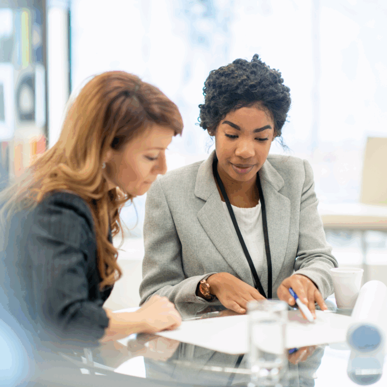 two women collaborating