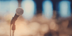Spotlight on stage symbolizing WIA speaking opportunities